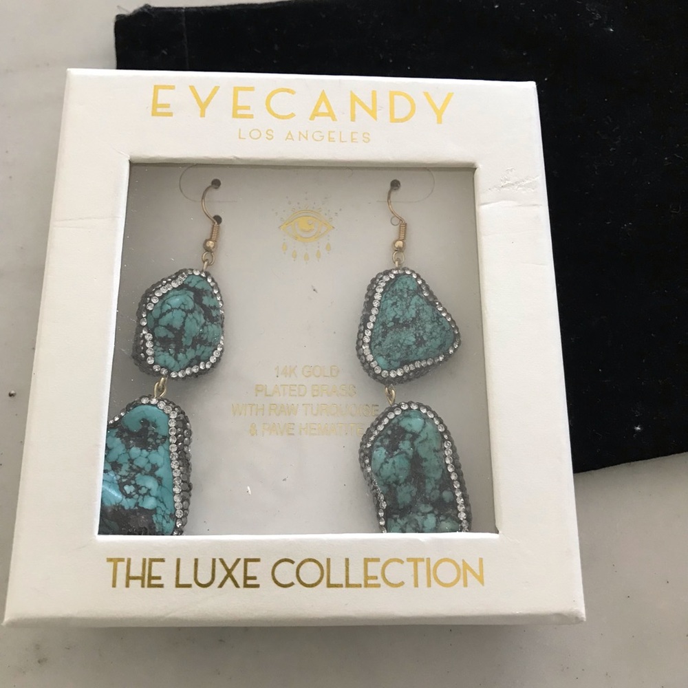 Earrings by Eye Candy Luxe Collection.